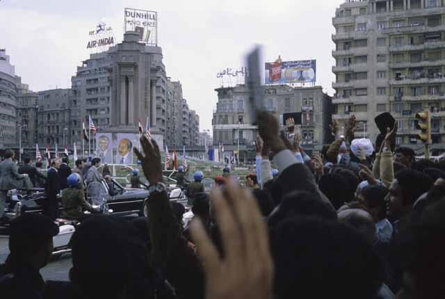 U.S. President Jimmy Carter (waving) and Egyptian President Anwar Sadat pass through Tahrir Square in an open motorcade on Saturday 10 March, 1979. Tens of thousands of Egyptian lined the route every time the two leaders paraded through the streets of Cairo. Carter was instrumental in securing the peace treaty between Egypt and Israel. The peace treaty was signed two weeks later in Washington on 26 March 1979. Ph. Norbert Schiller
